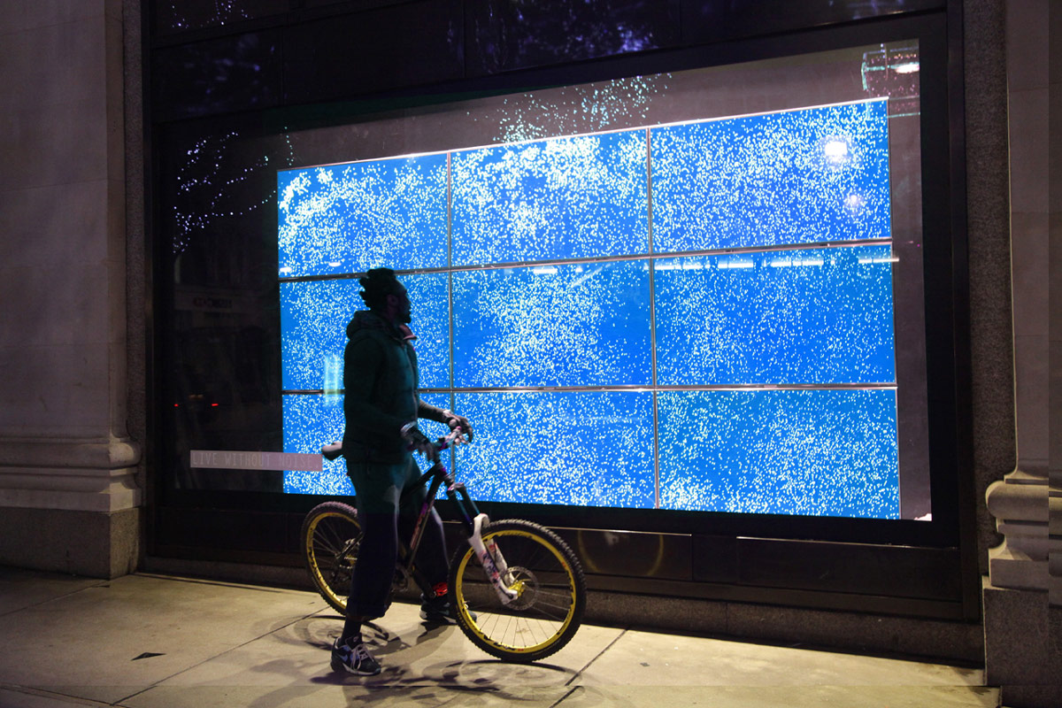 A passer-by triggering the No Noise installation at Selfridges on Oxford Street
